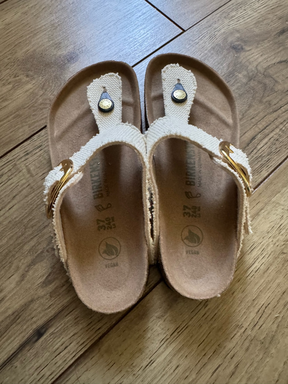 Berkinstocks Women’s Beige Canvas Thong Sandals with Gold Accent